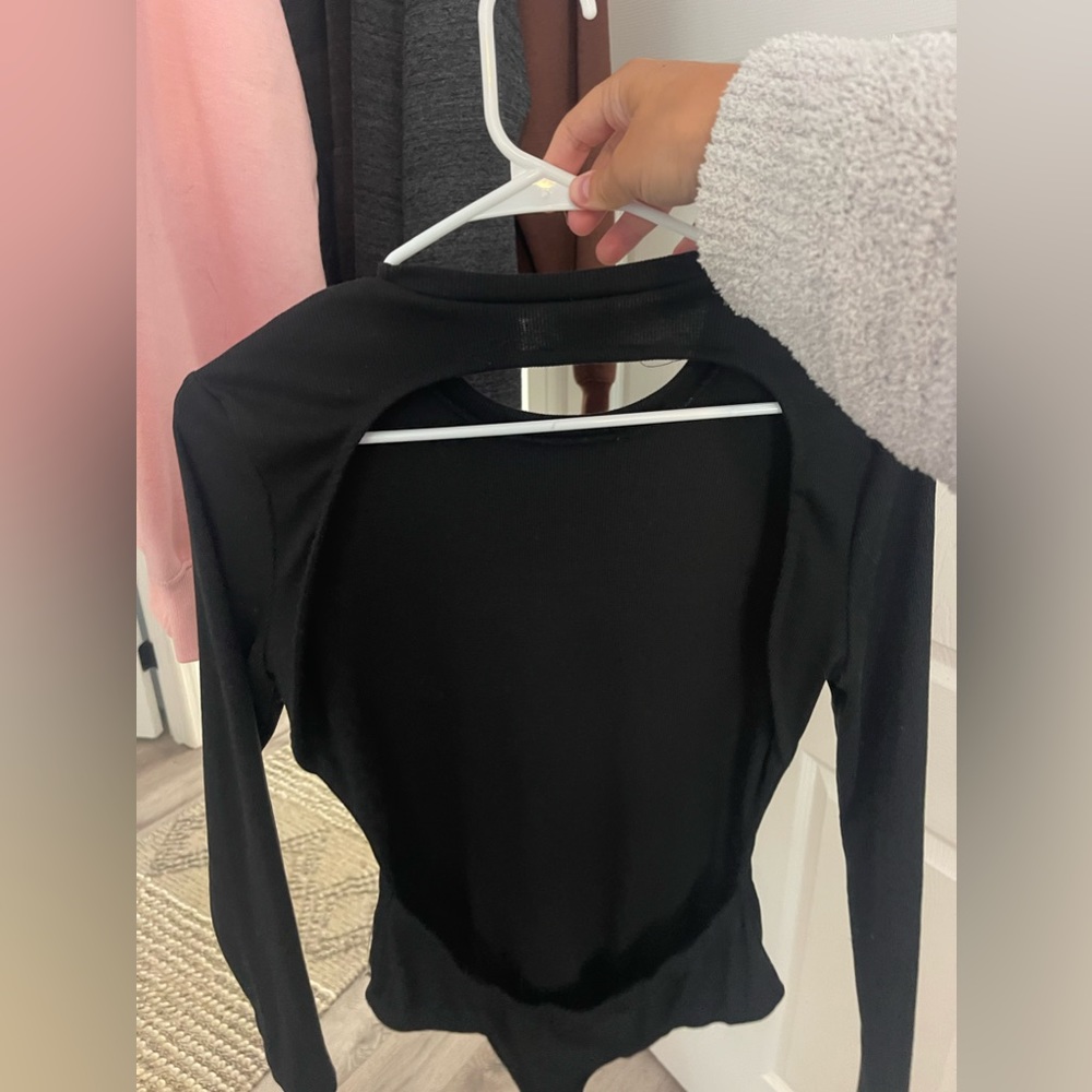 Adorable body suit with an open back